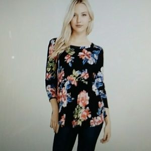 "Sierra Floral Top. Price firm